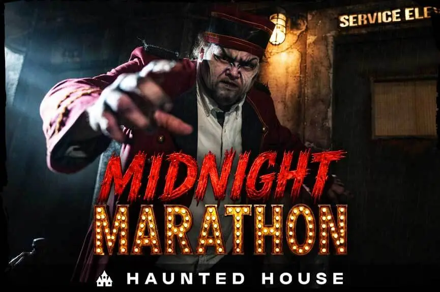 A terrifying, scarred bellhop in a crimson uniform reaches out aggressively in front of a rusted service elevator. The text reads "Midnight Marathon. Haunted House."